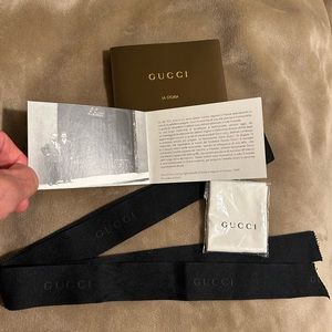 Gucci bundle!  43” ribbon, La Storia booklet and cleaning cloth